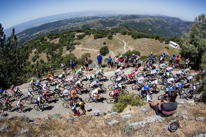 The peloton crests the Mt. Hamilton climb.
