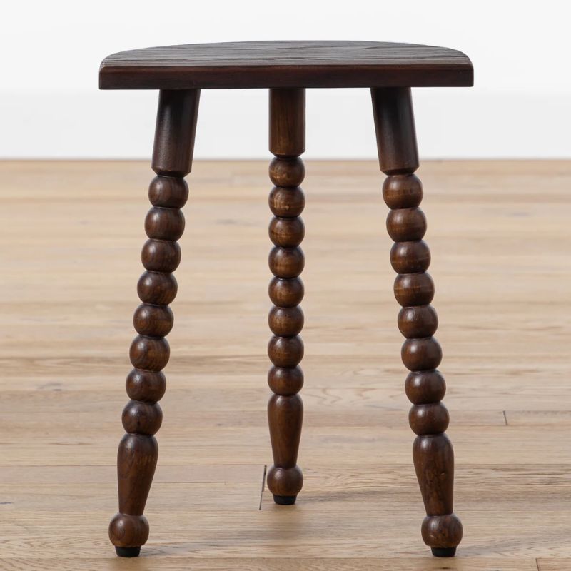 brown wood stool with turned legs
