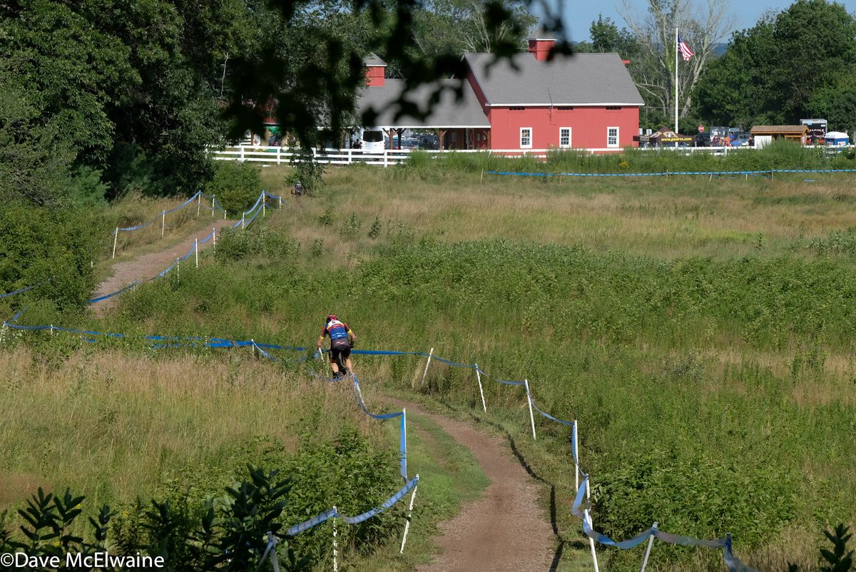 A racer returning to the venue through one of the open fields on Adams Farm