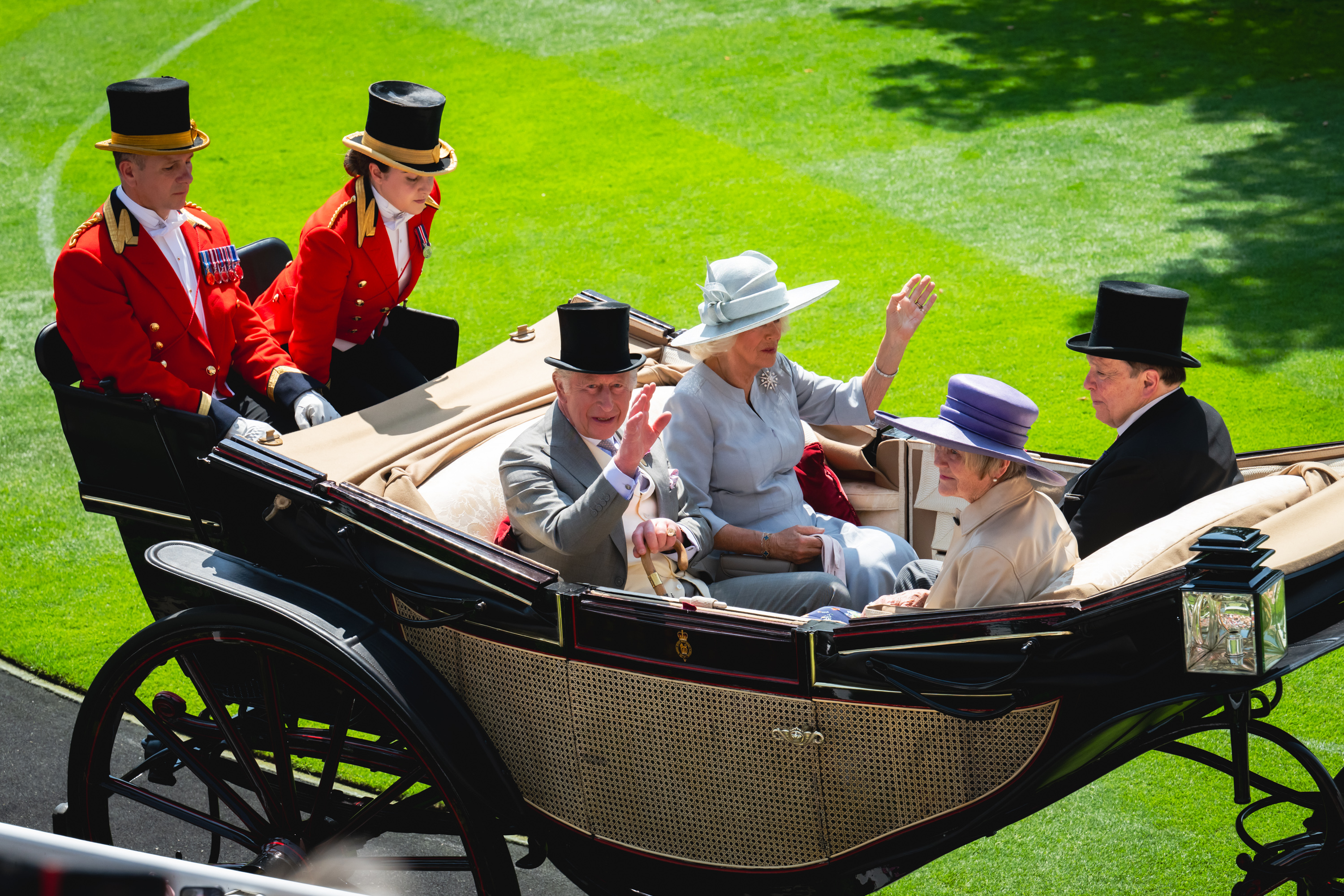 ASCOT, ENGLAND - JUNE 19: Britain&amp;amp;apos;s King Charles III and Britain&amp;amp;apos;s Queen Camilla arrive in a horse-drawn carriage as the Royal Procession arrives in the Parade Ring on Ladies Day on the 3rd day of Royal Ascot on June 19, 2025 in Ascot, England. (Photo by Kirstin Sinclair/Getty Images for Royal Ascot 2025)