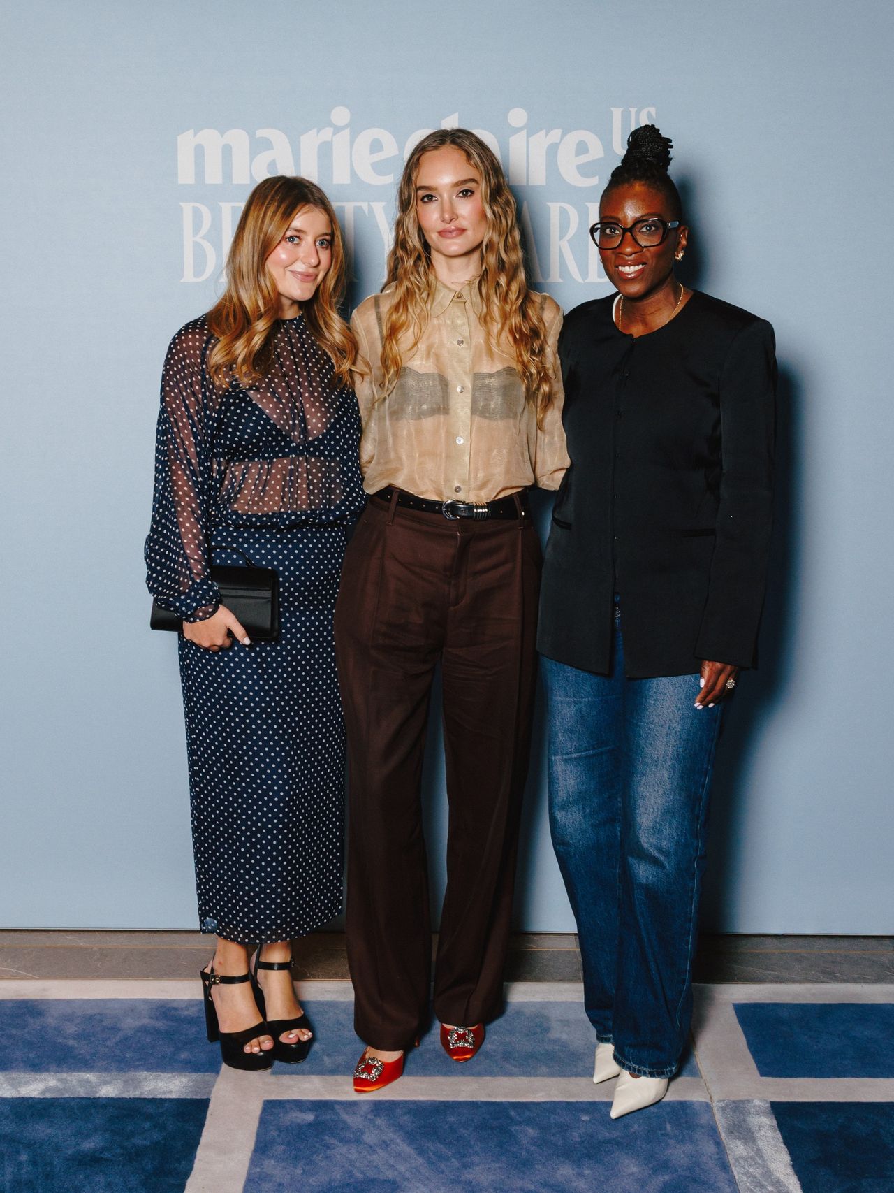 three people at a party in NYC