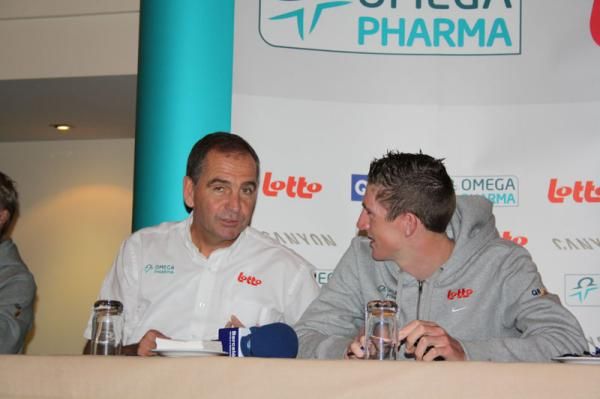 Marc Sergeant and Van Den Broeck chat before the start of the press conference