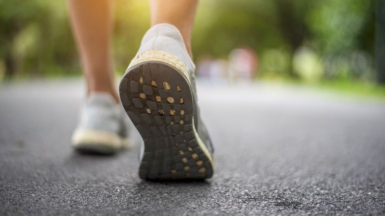 Woman wearing a pair of the best shoes for walking