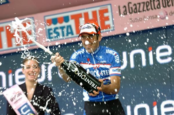 Stage five winner Jerome Pineau (Quick Step) uncorks some bubbly after his first Grand Tour victory.