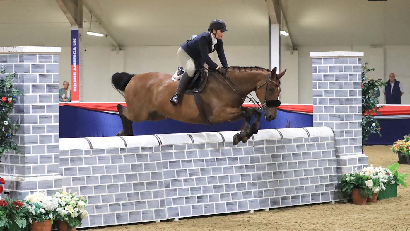 Jenny Keepe with Harlequin Express shared the honours in the working hunter puissance competition at UK nationals showing show