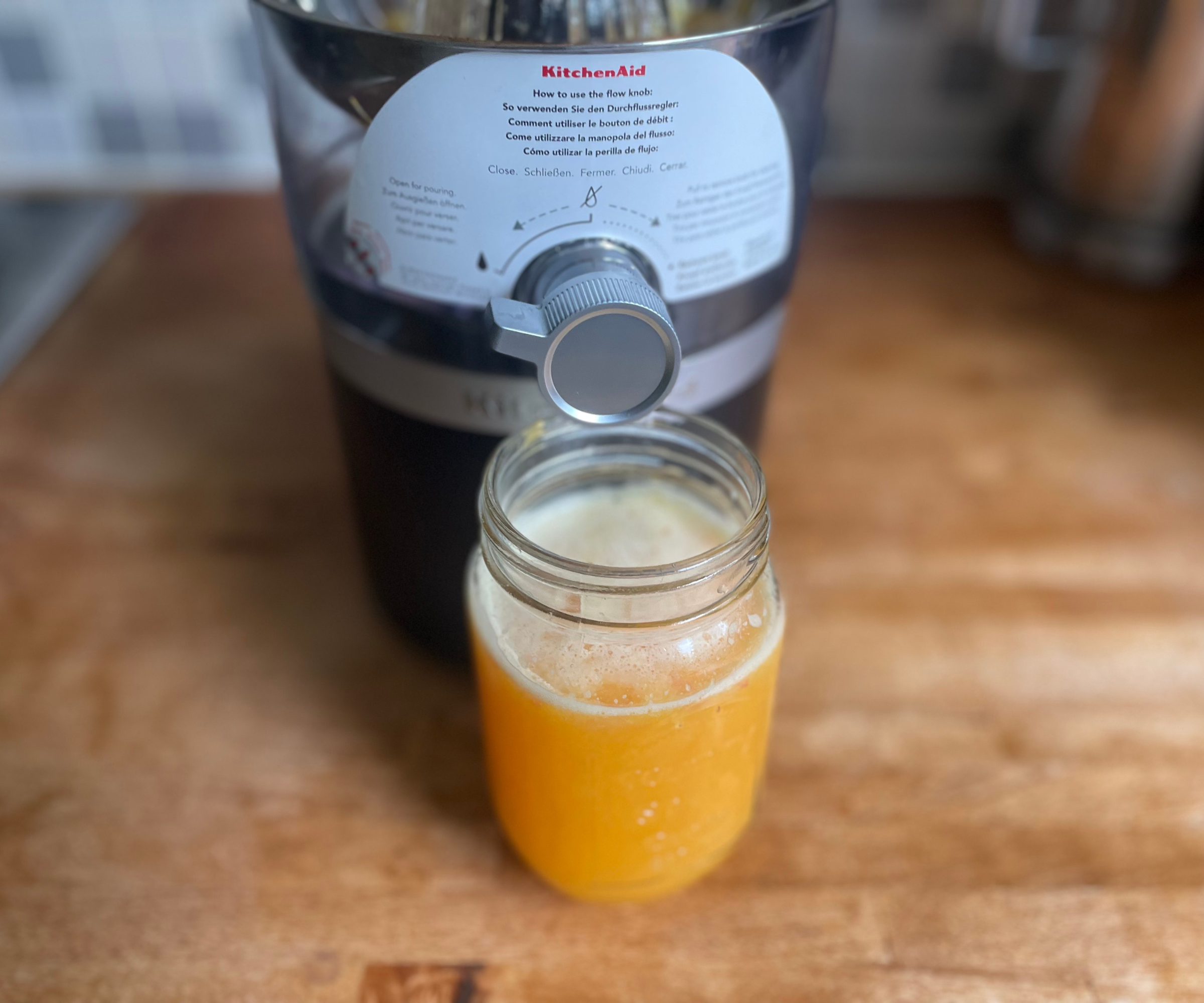 KitchenAid Go Cordless Citrus Juicer making orange juicer