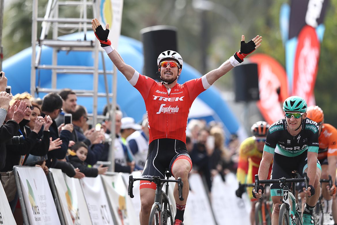 Degenkolb raises his arms in celebration