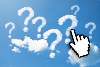 A finger icon tapping on one of many question mark-shaped clouds.