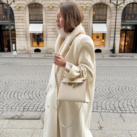 Woman in ivory outfit