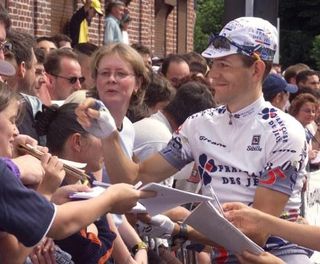 Christophe Bassons signs autographs during the 1999 Tour de France.