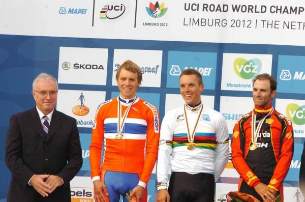 UCI President Pat McQuiad joins Boasson Hagen, Gilbert and Valverde on the podium