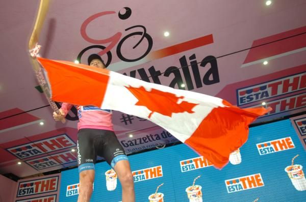 Ryder Hesjedal (Garmin-Barracuda) with the Canadian national flag