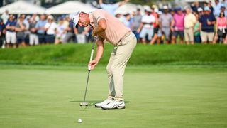 Lucas Glover putts during the BMW Championship at Olympia Fields