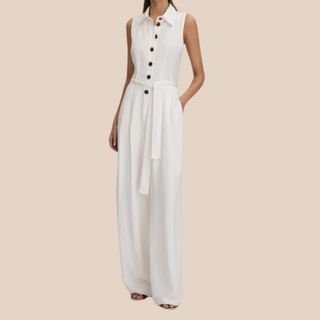 Flat lay image of a woman wearing a white jumpsuit