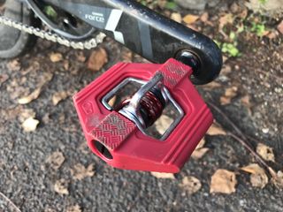 Image shows the Crankbrothers Candy 1 pedals mounted on a bike
