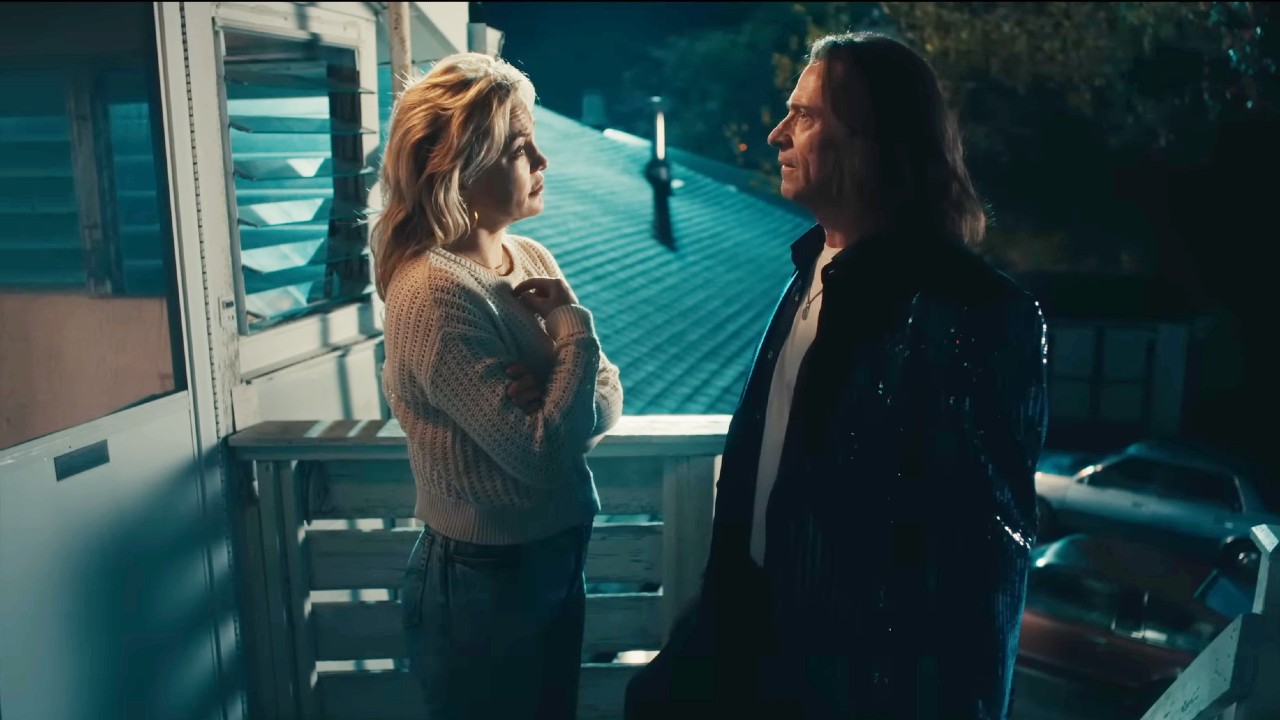 Kate Hudson and Hugh Jackman look at each other in Song Sung Blue.