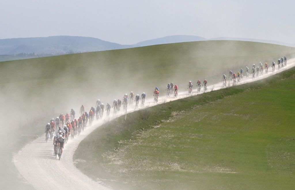 SIENA ITALY MARCH 08 A general view of the peloton passing through a landscape during the 19th Strade Bianche 2025 Mens Elite a 213km one day race from Siena to Siena 320m UCIWT on March 08 2025 in Siena Italy Photo by Tim de WaeleGetty Images