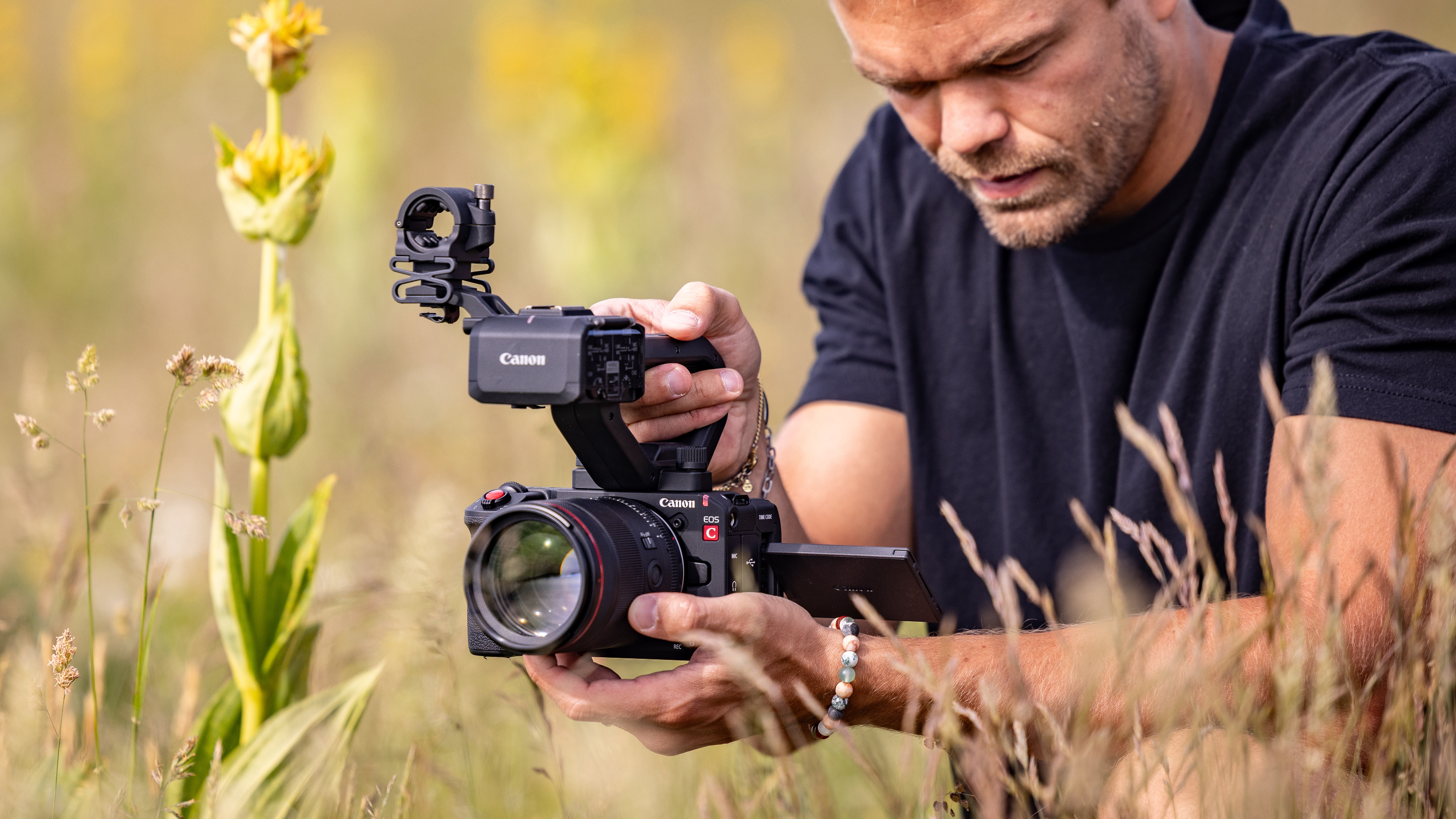 Canon EOS C50 being used by a videographer