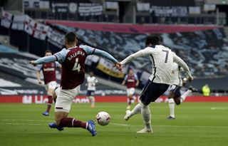 Son Heung-min, right, scores against West Ham