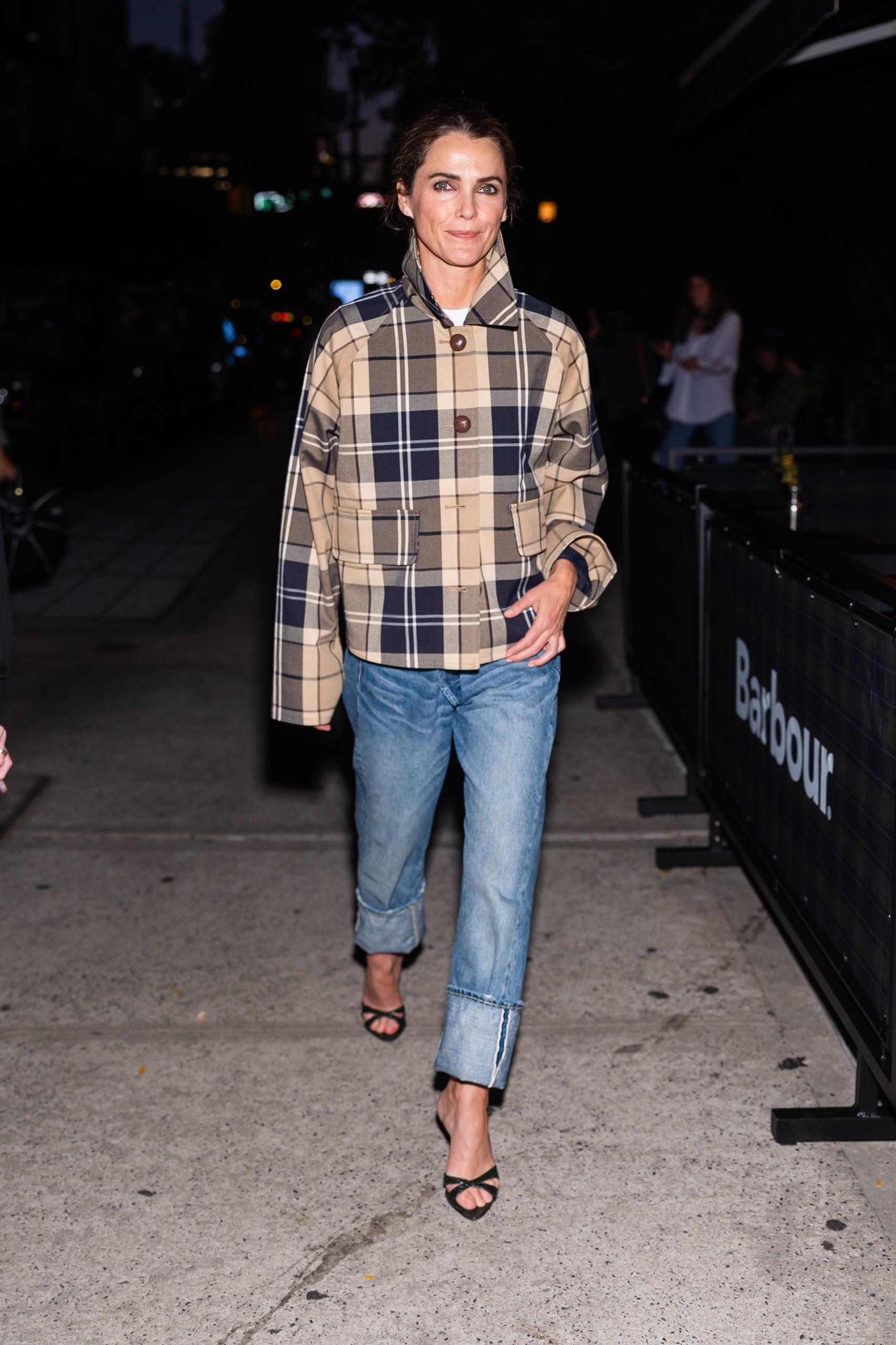Keri Russell attended a Barbour event in New York City in a plaid jacket, cuffed jeans, and strappy sandals