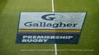 Premiership rugby logo painted on a rugby pitch