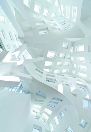 The Cleveland Clinic at Las Vegas' Lou Ruvo Center for Brain Health. A view up of the curved structures with windows in them.