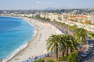 A celebrated promenade along the Mediterranean beach at Nice, one of the best foodie cities in France