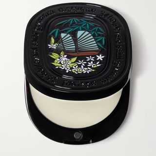 Diptyque Diptyque Do Son Solid Perfume in a black perfume case is one of the best Christmas beauty gifts for her. 