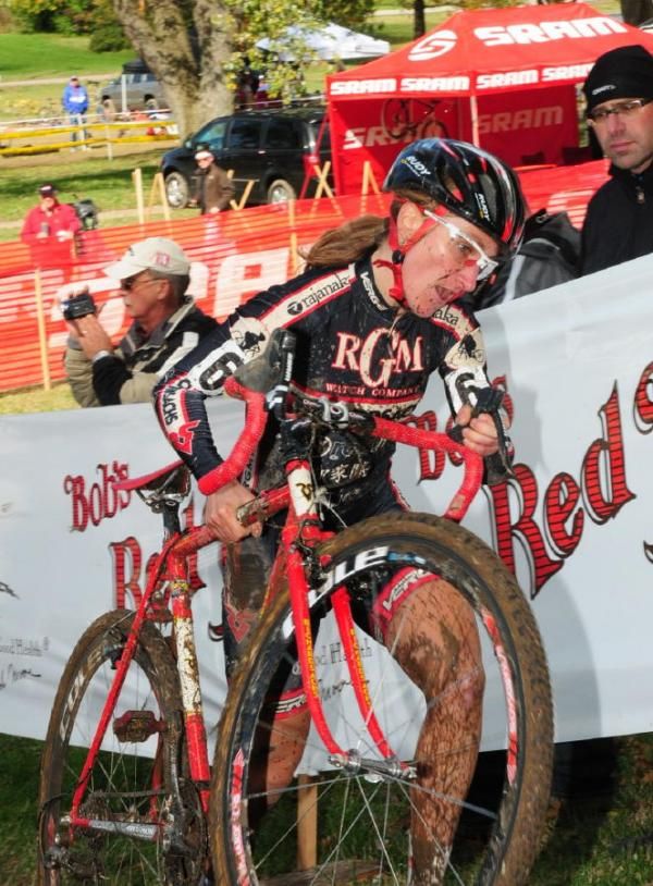 Amy Dombroski (Richard Sachs-RGM Watches) over the barriers