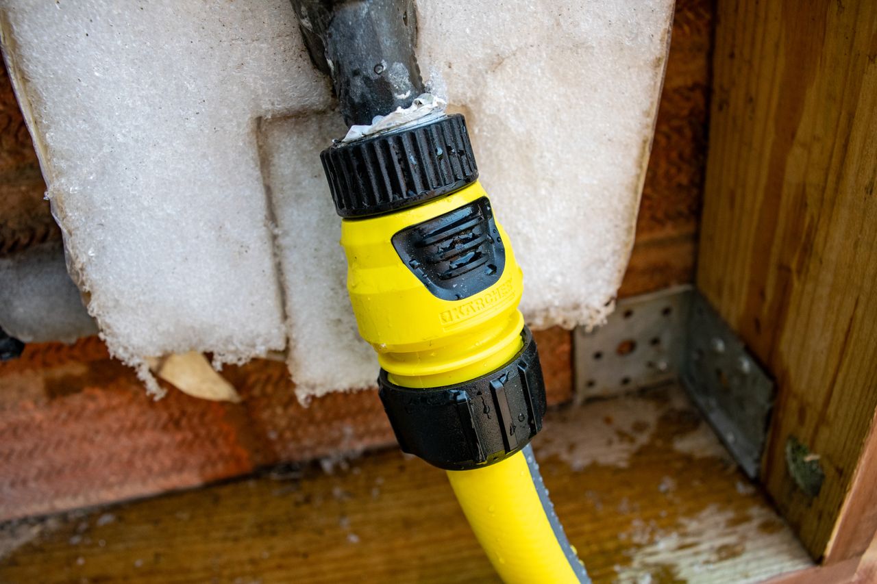 A yellow Karcher K2 Pressure washer hose