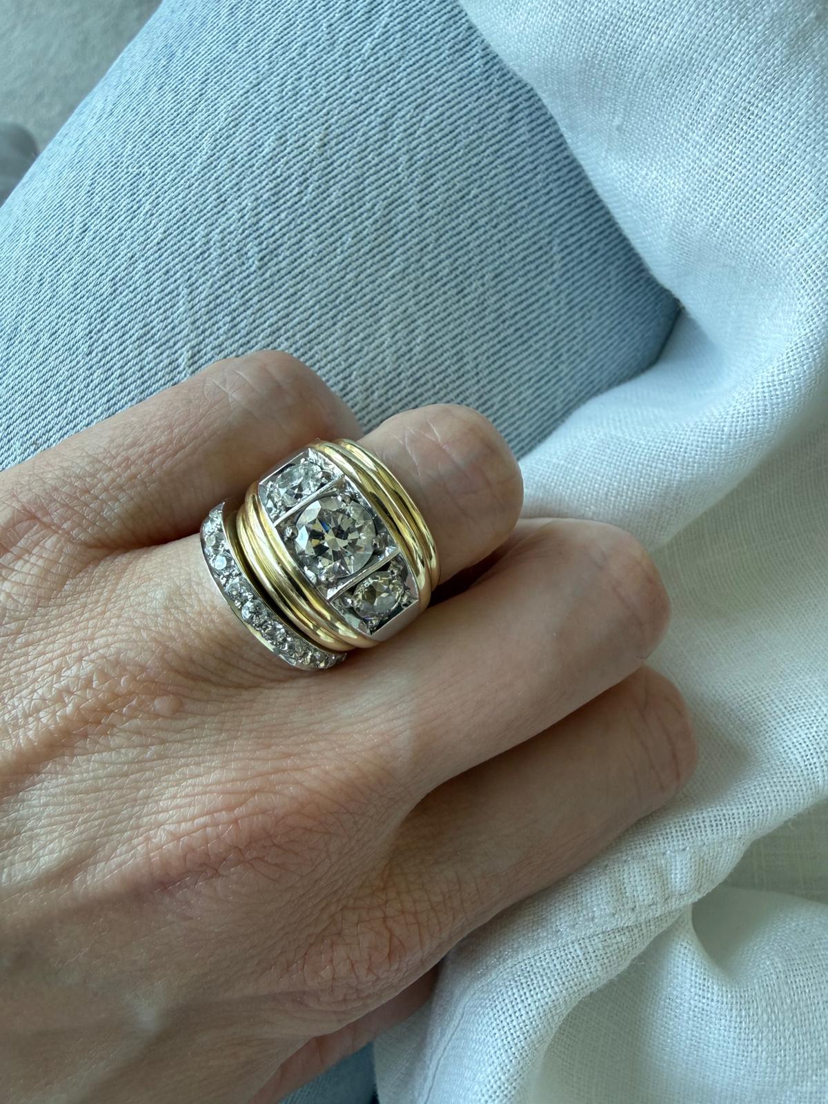 a close up of Georgia Radhakrishnan's lylie engagement ring and wedding band