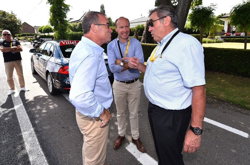 Eddy Merckx and Bernard Hinault having a chat
