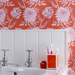 washbasin with floral wallpaper