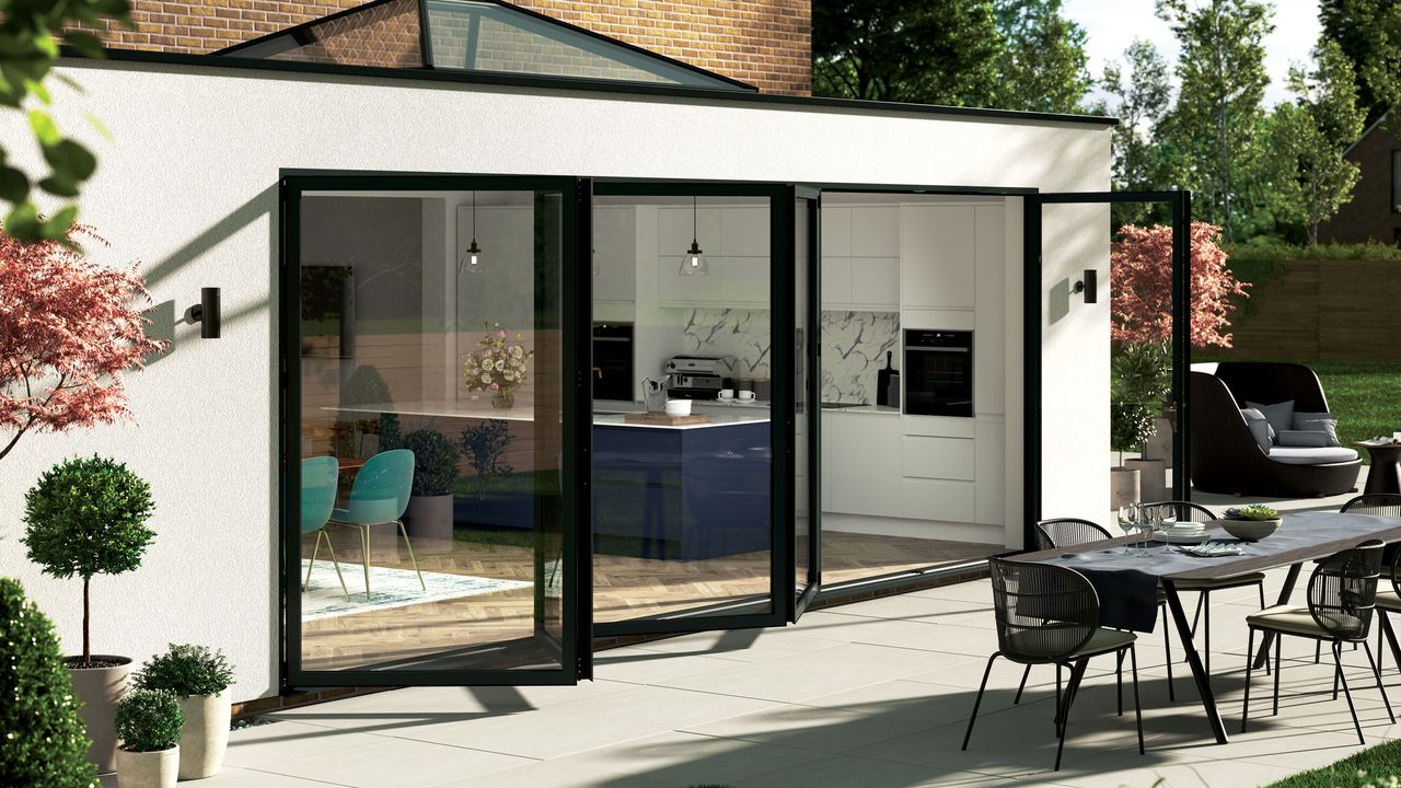 Black framed concertina bi-folding doors to back of house 