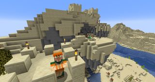 Minecraft - A desert villager on top of a tower looks at the player. Behind them is a desert village that's spawned on a hill and has several floating tiers.