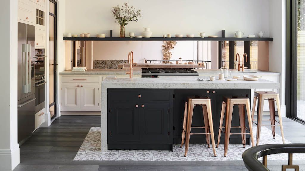 bespoke kitchen with bronze mirrored splashbacks and island