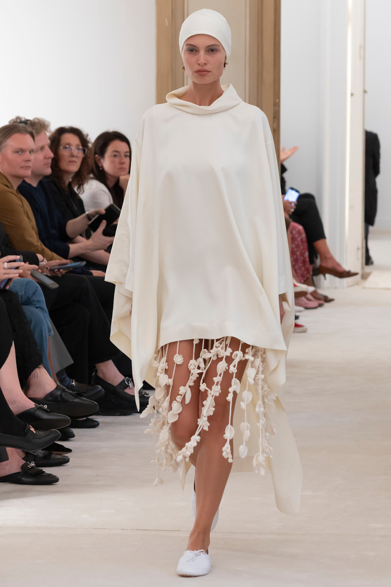 Model wears texture on the Ferretti runway.