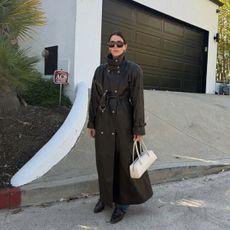 Jen Wonders in a funnel-neck leather jacket