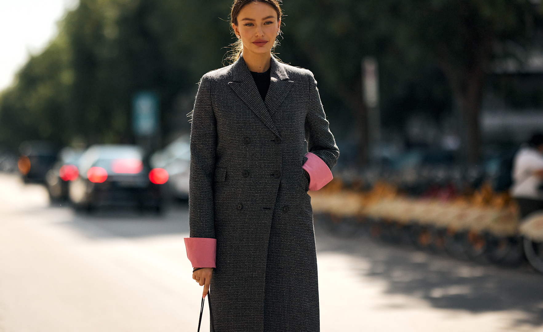woman wearing a coat in milan
