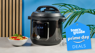 a black instant pot pressure cooker multi cooker with a Prime Day Tom&#039;s Guide deal badge