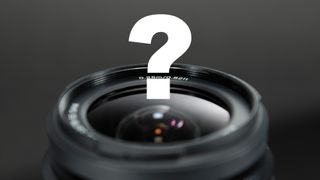 Camera lens studio image with question mark