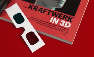 Close-up of the magazine cover against a red background and with a pair of 3D glasses