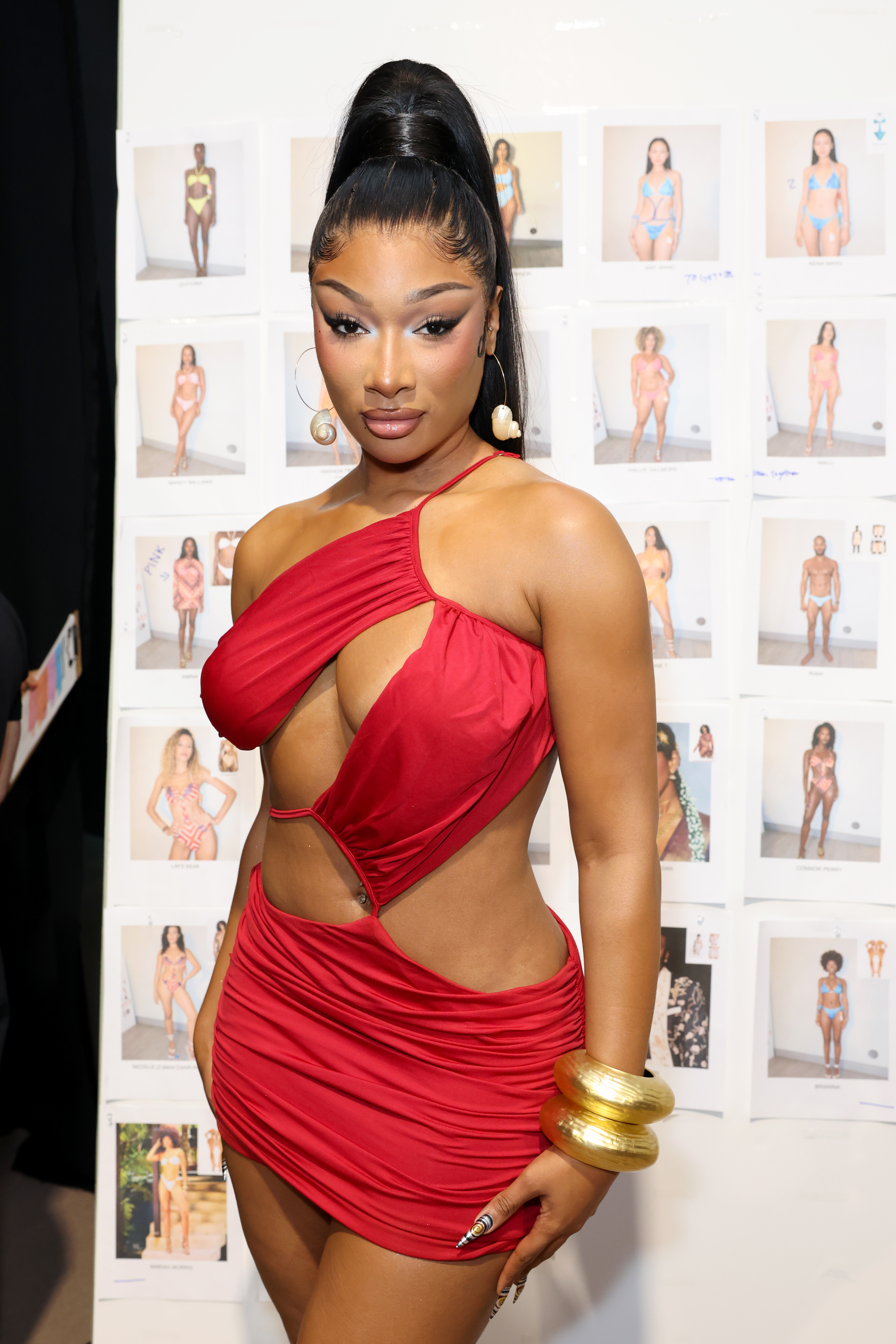 Megan Thee Stallion switched her cut-out-heavy swimsuit for a similar mini dress at Miami Swim Week