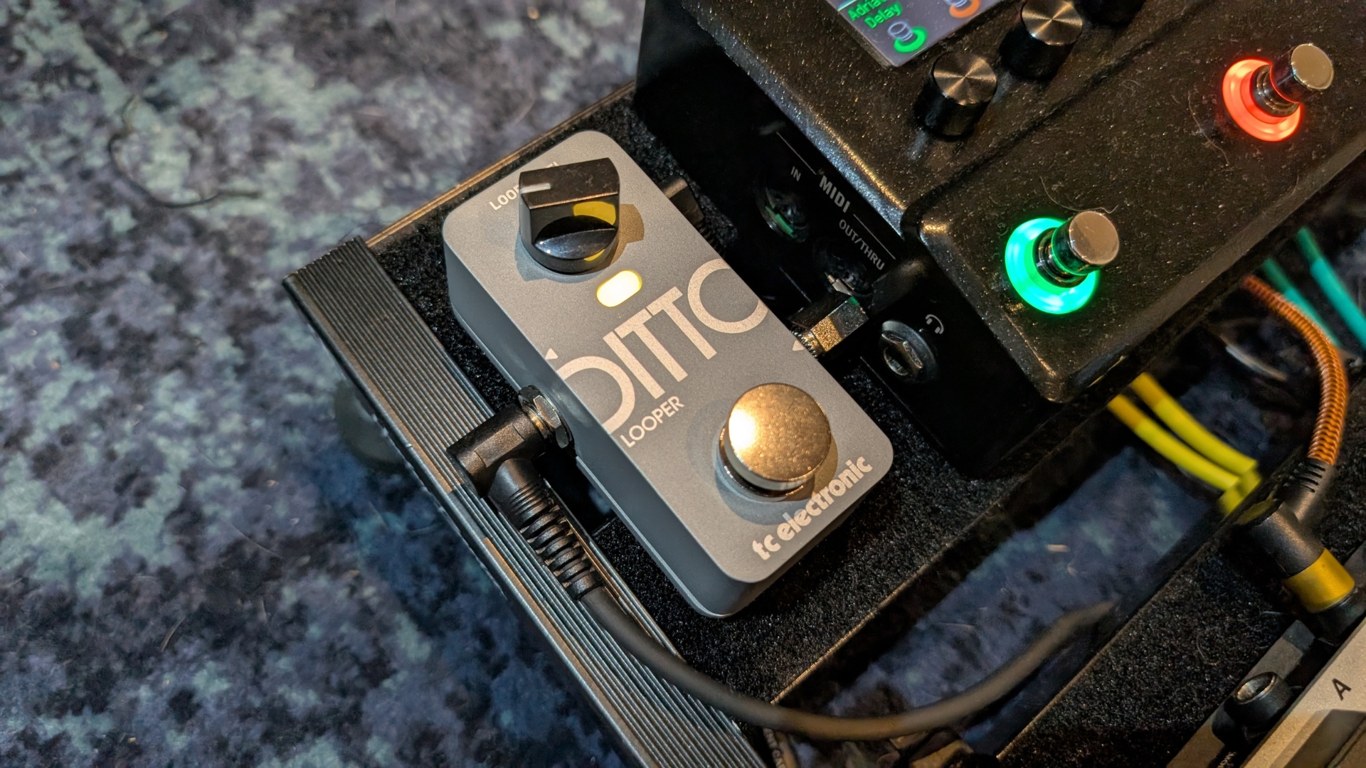 A TC Electronic Ditto 2 looper pedal on a pedalboard