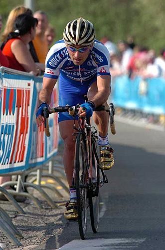 Paolo Bettini (Quick.Step) heads for the corner