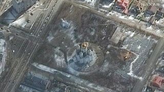 A WorldView-3 satellite image of grounds of the Church of St. Andrew and Pyervozvannoho All Saints, on March 10. The initial excavation of the probable mass grave can be seen center right.