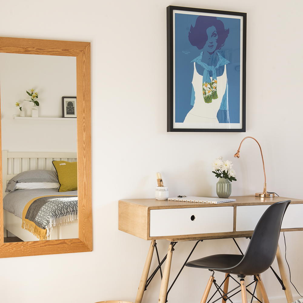 living room with white walls and wooden table