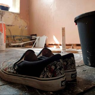 bathroom with shoes bucket blur background