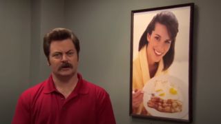 Ron Swanson posing next to a photo of a woman holding breakfast food