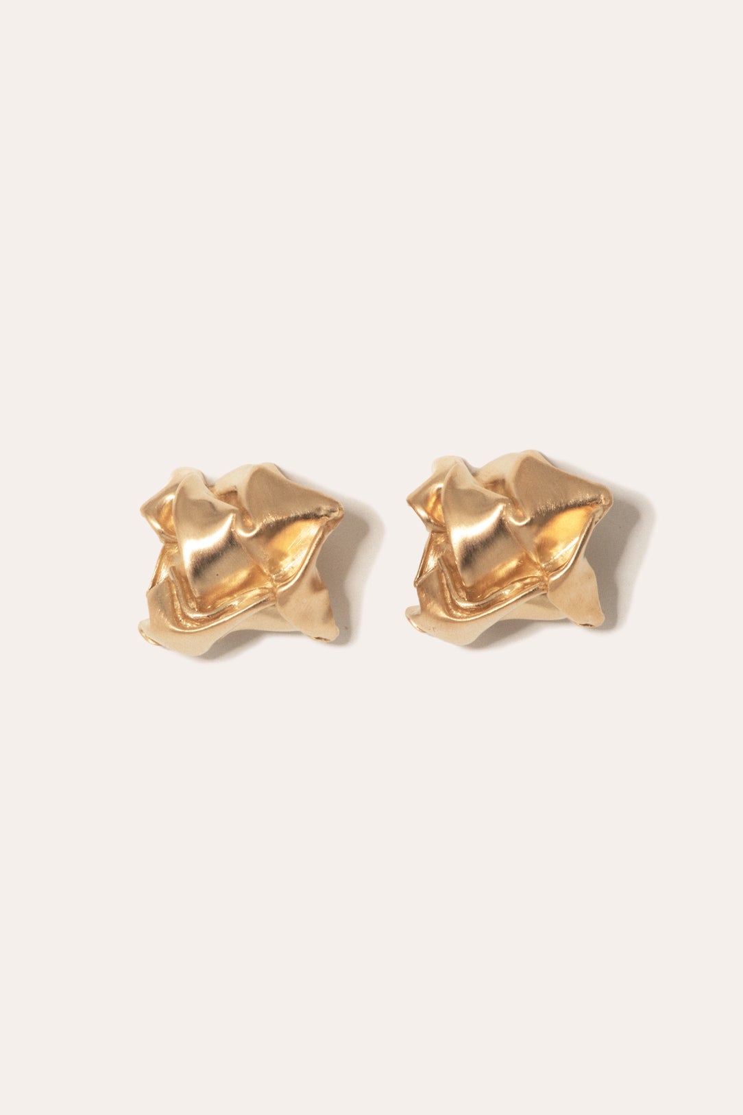 Crunched: A story of abandoned legal strategies - gold sluggish earrings